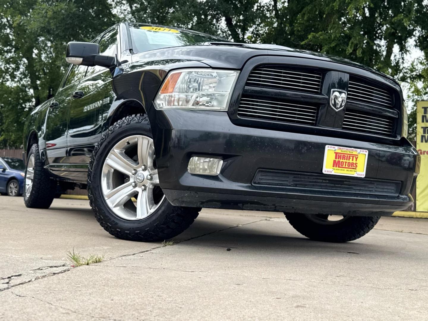 2011 Black Dodge Ram 1500 SLT Crew Cab 2WD (1D7RB1CT8BS) with an 5.7L V8 OHV 16V engine, 5-Speed Automatic transmission, located at 16710 Clay Rd., Houston, TX, 77084, (281) 859-7900, 29.834864, -95.656166 - Photo#22