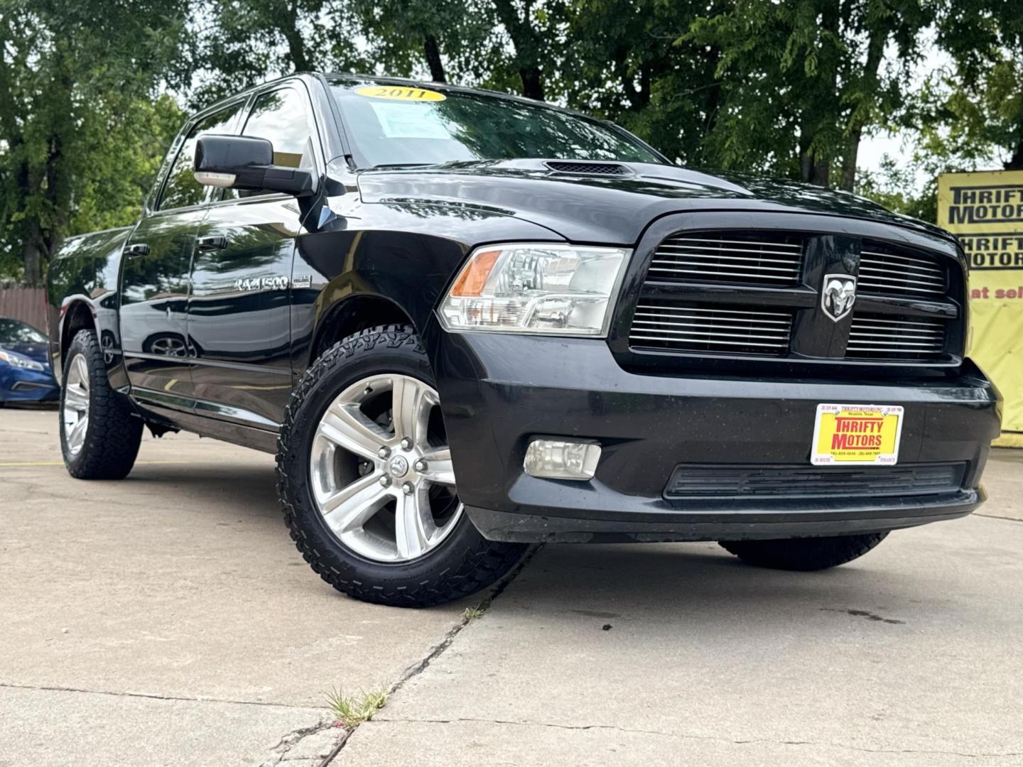 2011 Black Dodge Ram 1500 SLT Crew Cab 2WD (1D7RB1CT8BS) with an 5.7L V8 OHV 16V engine, 5-Speed Automatic transmission, located at 16710 Clay Rd., Houston, TX, 77084, (281) 859-7900, 29.834864, -95.656166 - Photo#21