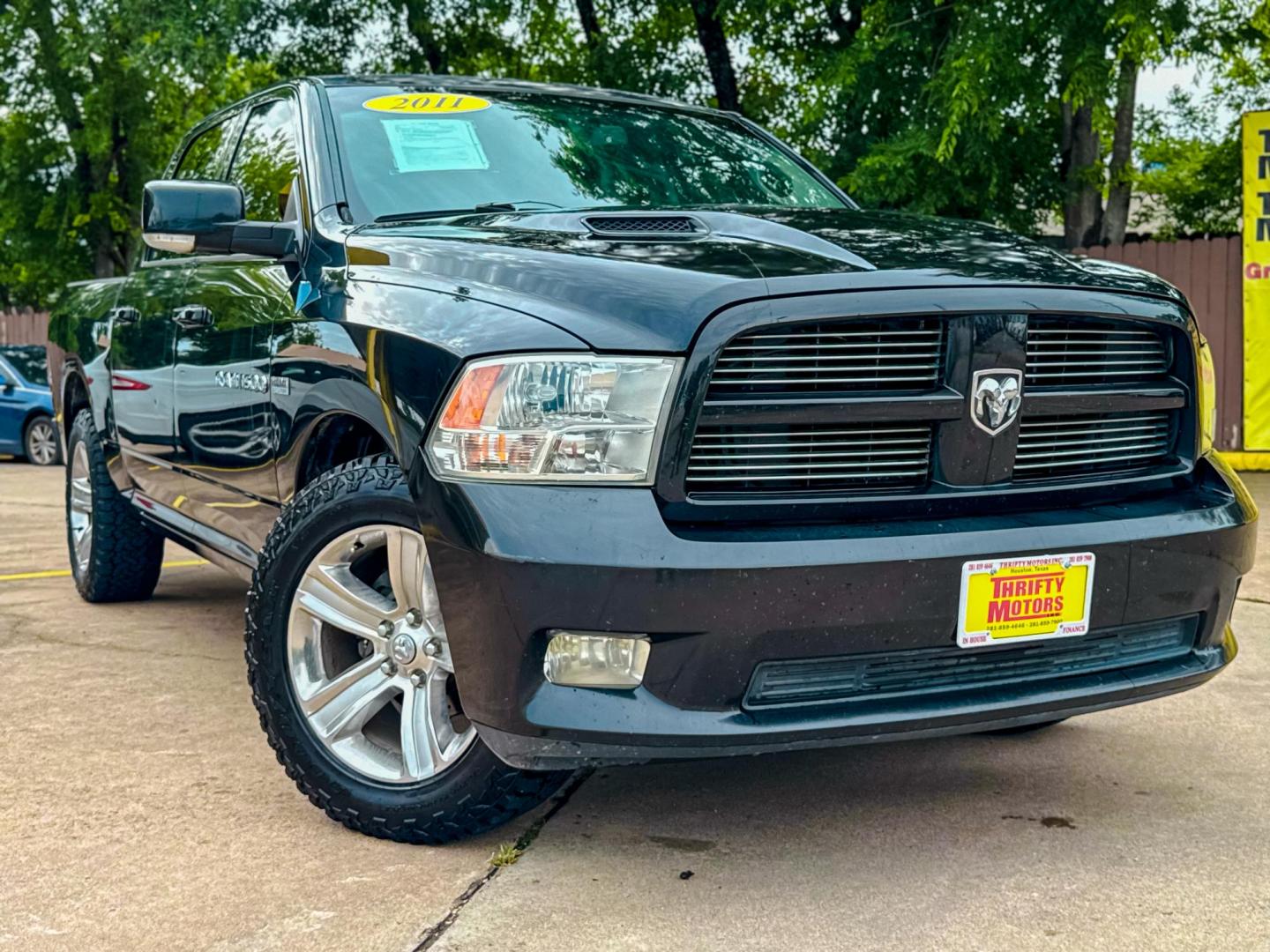 2011 Black Dodge Ram 1500 SLT Crew Cab 2WD (1D7RB1CT8BS) with an 5.7L V8 OHV 16V engine, 5-Speed Automatic transmission, located at 16710 Clay Rd., Houston, TX, 77084, (281) 859-7900, 29.834864, -95.656166 - Photo#0