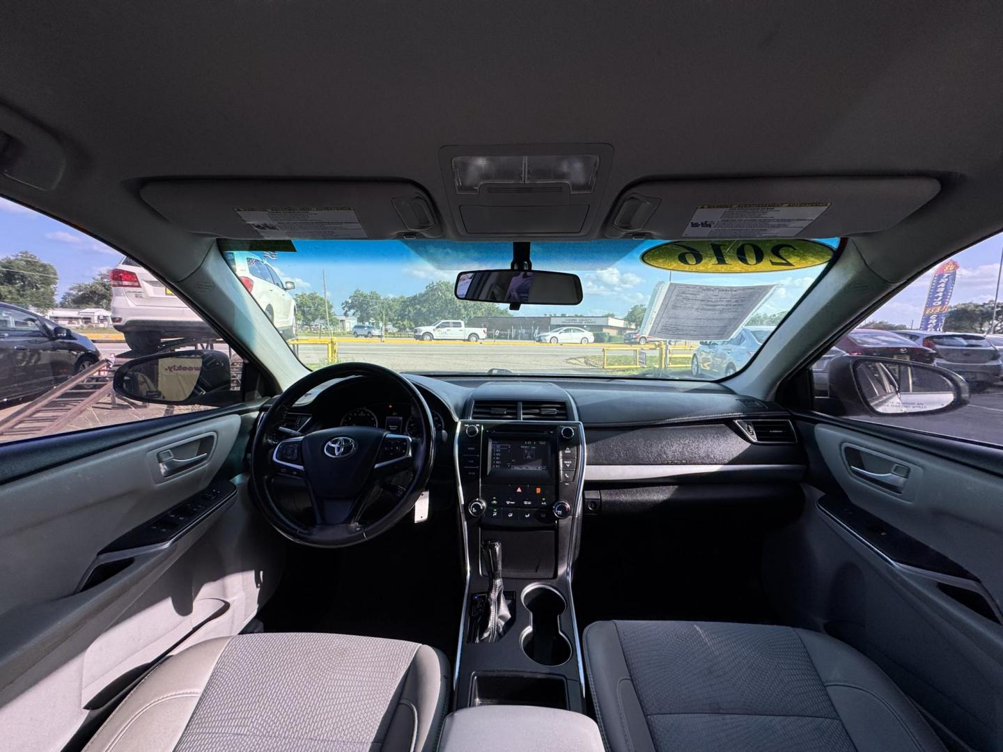 2016 Silver Toyota Camry SE (4T1BF1FKXGU) with an 2.5L L4 DOHC 16V engine, 6-Speed Automatic transmission, located at 16710 Clay Rd., Houston, TX, 77084, (281) 859-7900, 29.834864, -95.656166 - Photo#2