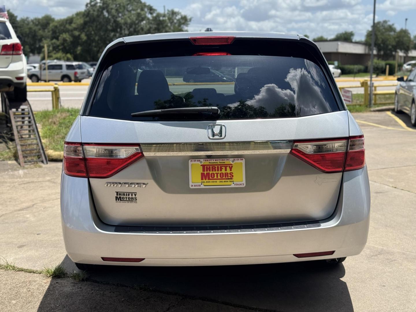 2011 Gray Honda Odyssey EX-L (5FNRL5H62BB) with an 3.5L V6 SOHC 24V engine, 5-Speed Automatic transmission, located at 16710 Clay Rd., Houston, TX, 77084, (281) 859-7900, 29.834864, -95.656166 - Photo#4