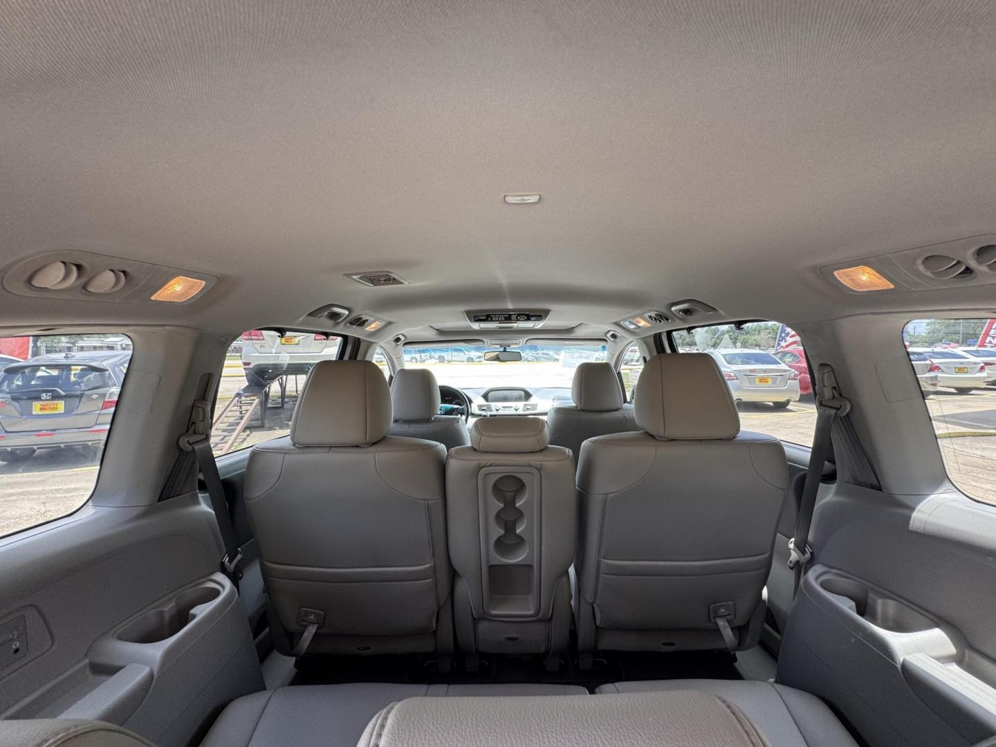 2011 Gray Honda Odyssey EX-L (5FNRL5H62BB) with an 3.5L V6 SOHC 24V engine, 5-Speed Automatic transmission, located at 16710 Clay Rd., Houston, TX, 77084, (281) 859-7900, 29.834864, -95.656166 - Photo#13