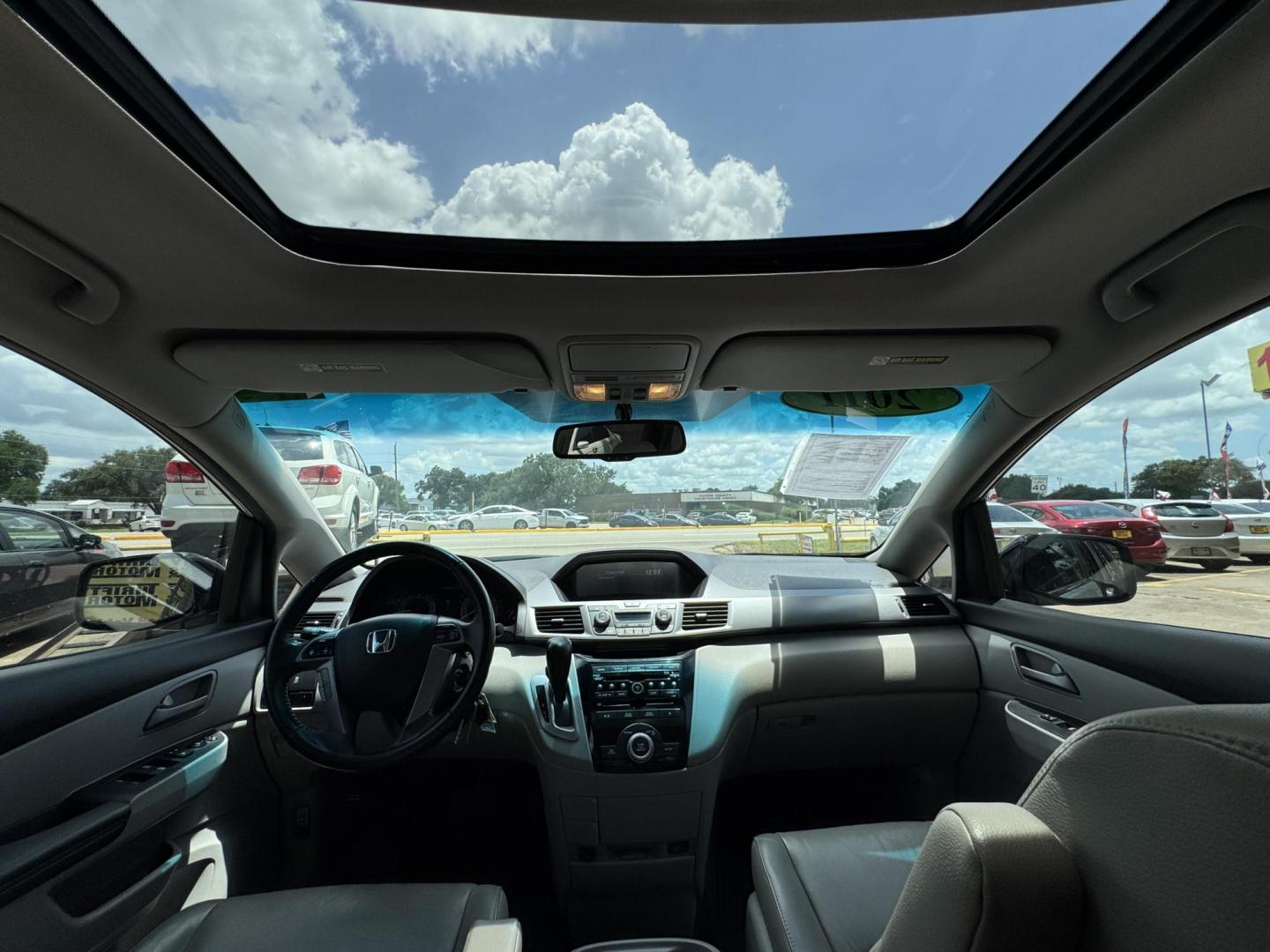 2011 Gray Honda Odyssey EX-L (5FNRL5H62BB) with an 3.5L V6 SOHC 24V engine, 5-Speed Automatic transmission, located at 16710 Clay Rd., Houston, TX, 77084, (281) 859-7900, 29.834864, -95.656166 - Photo#14