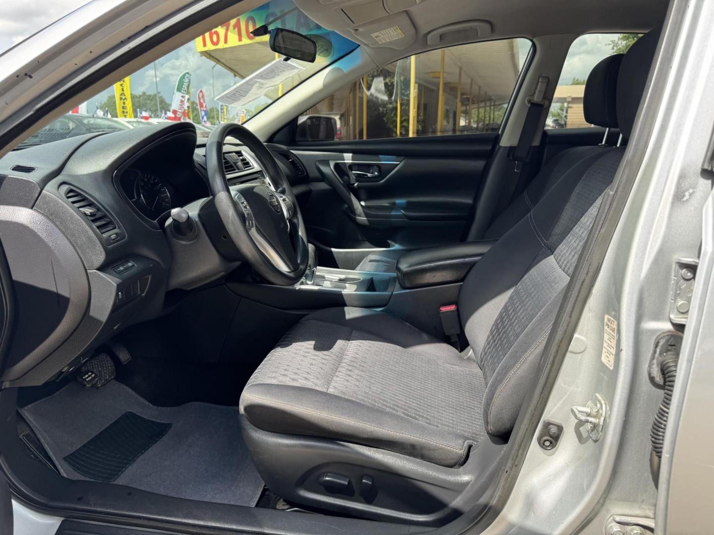 2016 Silver /gray Nissan Altima 2.5 SL (1N4AL3AP5GC) with an 2.5L L4 DOHC 16V engine, CVT transmission, located at 16710 Clay Rd., Houston, TX, 77084, (281) 859-7900, 29.834864, -95.656166 - Photo#5