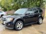 2009 Black /black Ford Escape Limited FWD V6 (1FMCU04GX9K) with an 3.0L V6 DOHC 24V engine, 4-Speed Automatic transmission, located at 16710 Clay Rd., Houston, TX, 77084, (281) 859-7900, 29.834864, -95.656166 - Photo#4
