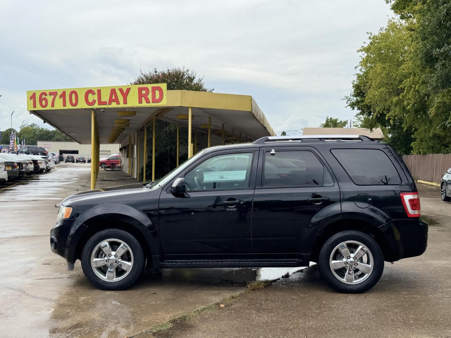2009 Black /black Ford Escape Limited FWD V6 (1FMCU04GX9K) with an 3.0L V6 DOHC 24V engine, 4-Speed Automatic transmission, located at 16710 Clay Rd., Houston, TX, 77084, (281) 859-7900, 29.834864, -95.656166 - Photo#6