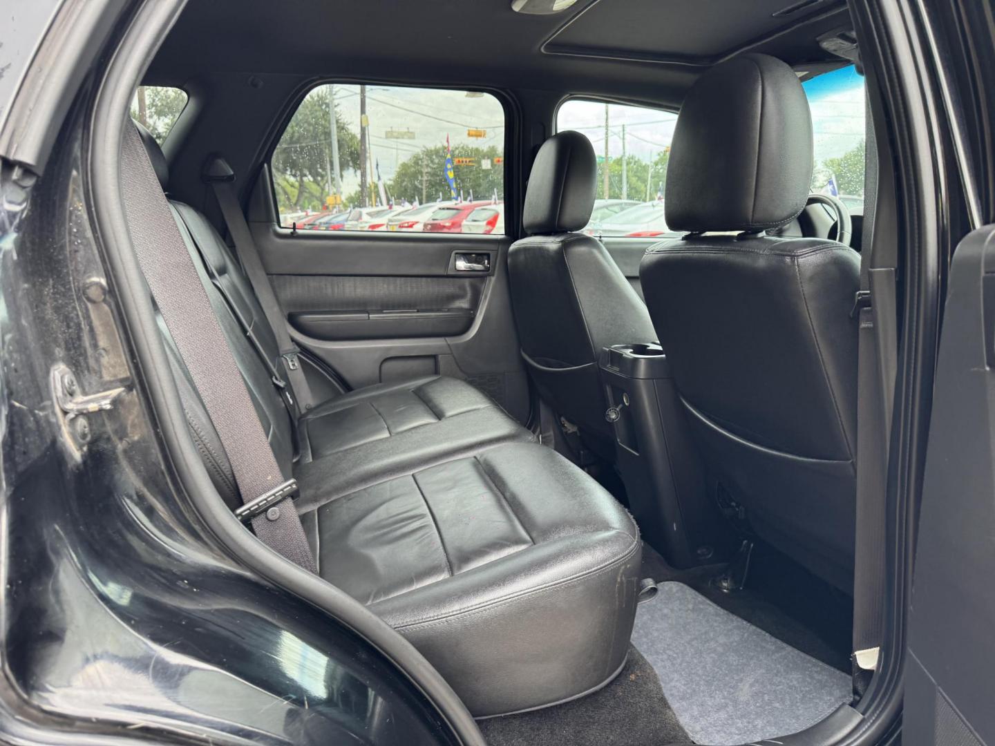 2009 Black /black Ford Escape Limited FWD V6 (1FMCU04GX9K) with an 3.0L V6 DOHC 24V engine, 4-Speed Automatic transmission, located at 16710 Clay Rd., Houston, TX, 77084, (281) 859-7900, 29.834864, -95.656166 - Photo#8