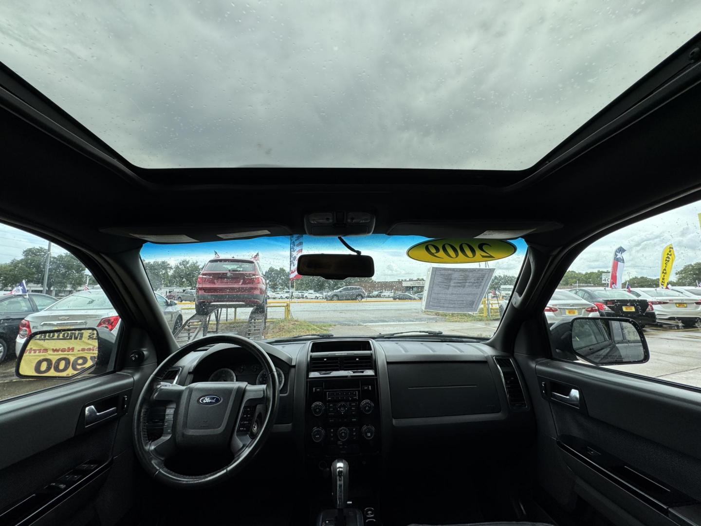 2009 Black /black Ford Escape Limited FWD V6 (1FMCU04GX9K) with an 3.0L V6 DOHC 24V engine, 4-Speed Automatic transmission, located at 16710 Clay Rd., Houston, TX, 77084, (281) 859-7900, 29.834864, -95.656166 - Photo#10