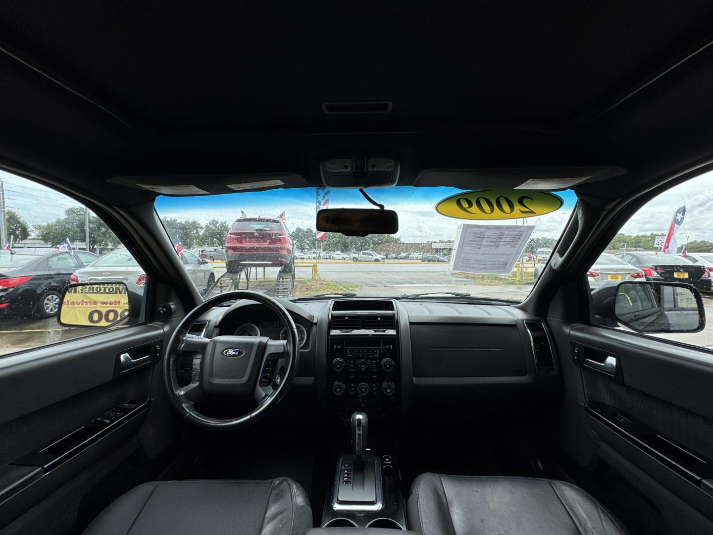 2009 Black /black Ford Escape Limited FWD V6 (1FMCU04GX9K) with an 3.0L V6 DOHC 24V engine, 4-Speed Automatic transmission, located at 16710 Clay Rd., Houston, TX, 77084, (281) 859-7900, 29.834864, -95.656166 - Photo#9