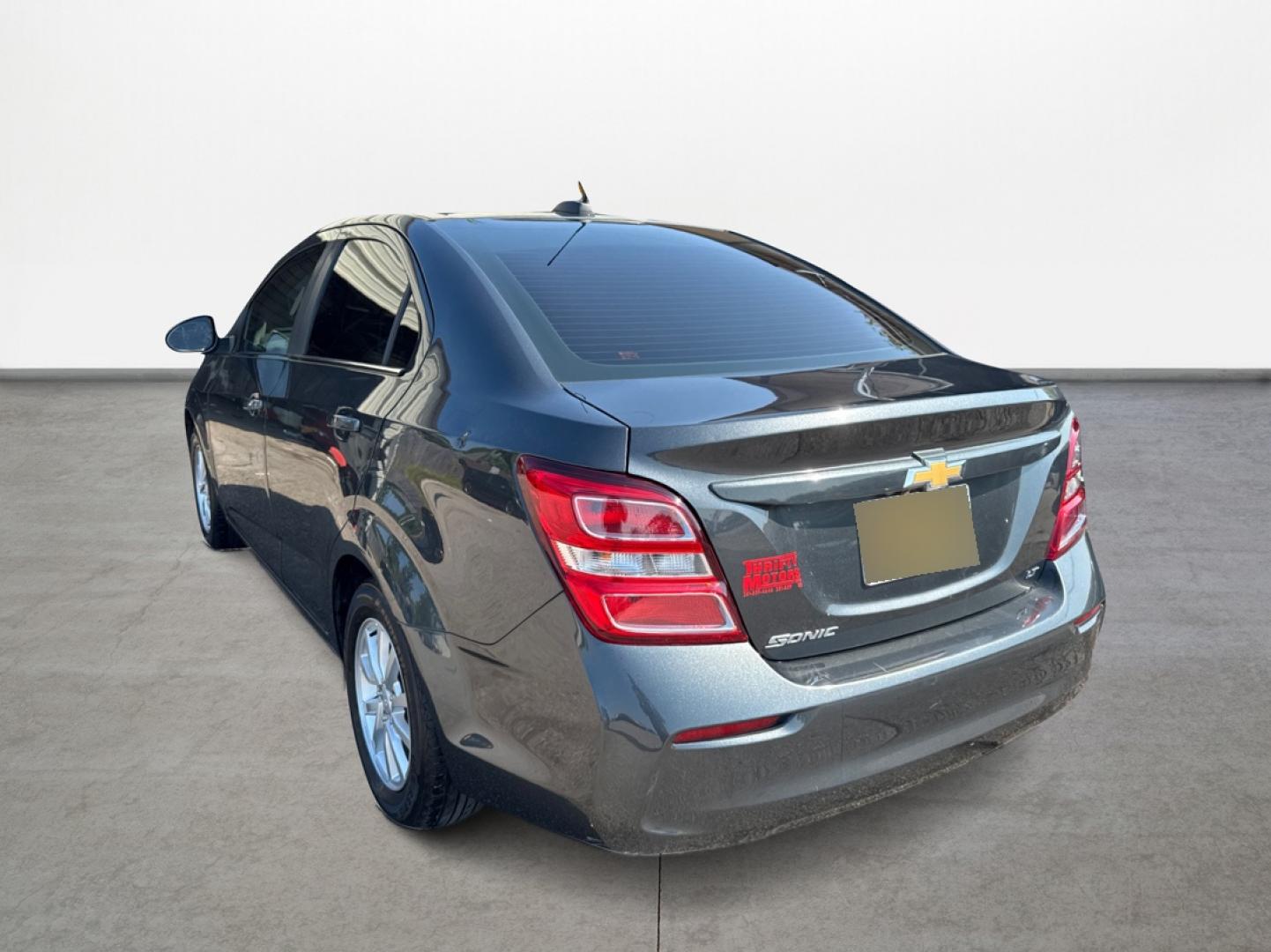 2020 Chevrolet Sonic LT Auto Sedan (1G1JD5SB0L4) with an 1.4L L4 DOHC 24V TURBO engine, 6A transmission, located at 16710 Clay Rd., Houston, TX, 77084, (281) 859-7900, 29.834864, -95.656166 - Photo#4
