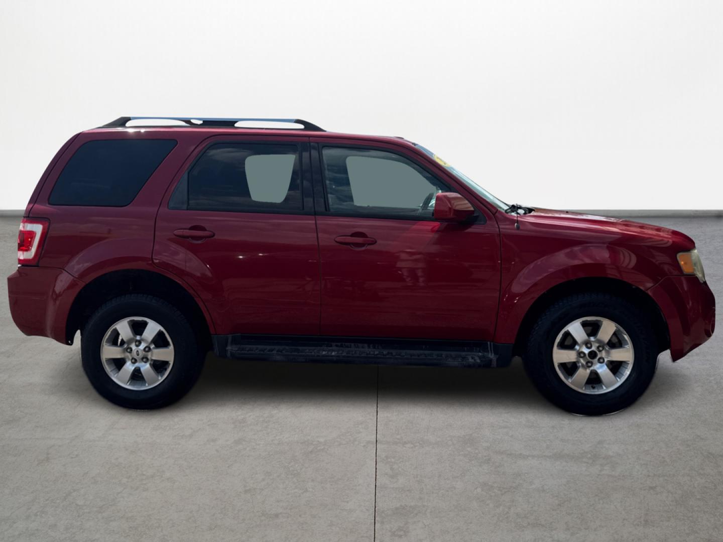 2010 Ford Escape Limited FWD (1FMCU0EG7AK) with an 3.0L V6 DOHC 24V engine, 6-Speed Automatic transmission, located at 16710 Clay Rd., Houston, TX, 77084, (281) 859-7900, 29.834864, -95.656166 - Photo#1