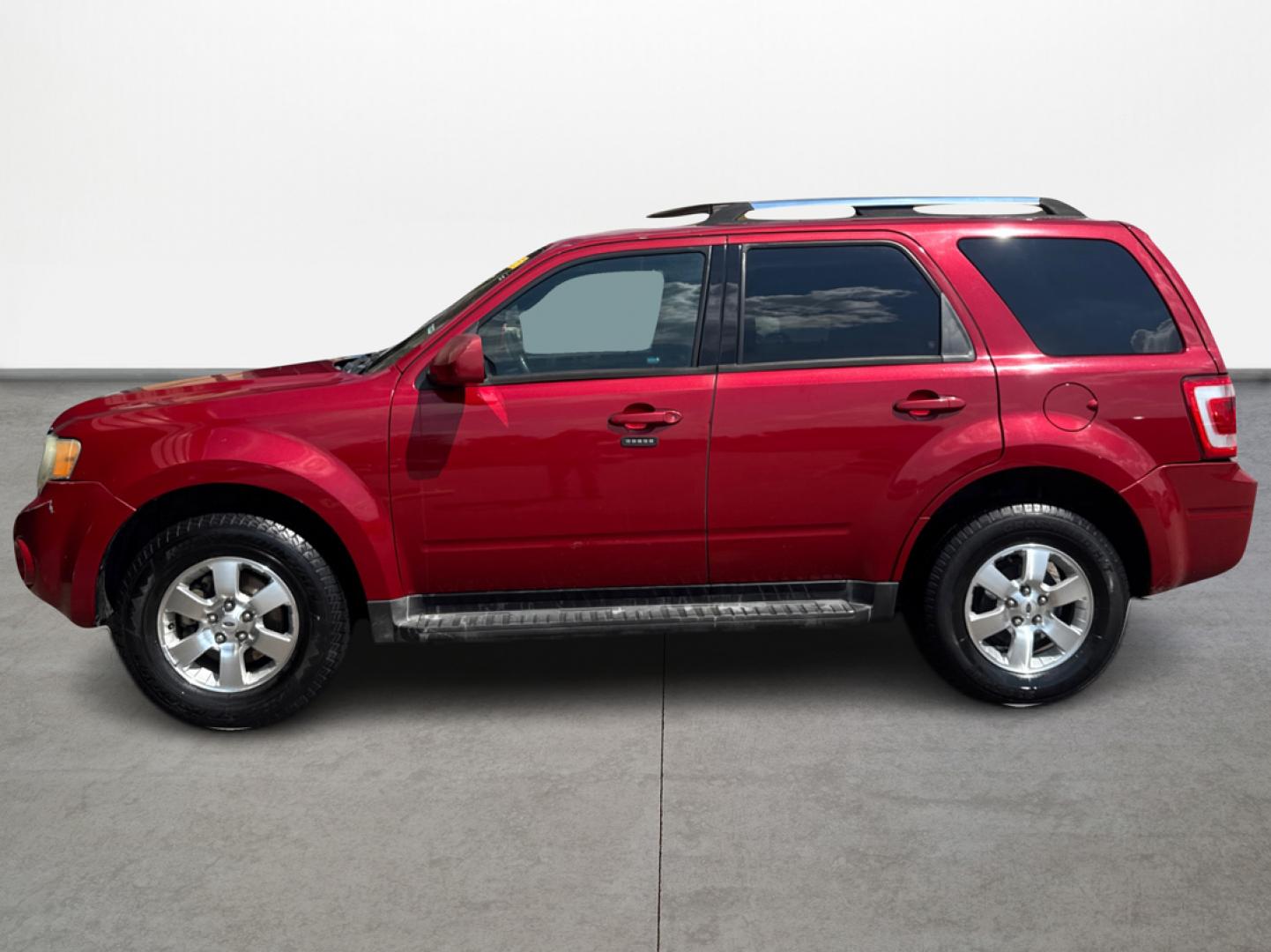 2010 Ford Escape Limited FWD (1FMCU0EG7AK) with an 3.0L V6 DOHC 24V engine, 6-Speed Automatic transmission, located at 16710 Clay Rd., Houston, TX, 77084, (281) 859-7900, 29.834864, -95.656166 - Photo#6