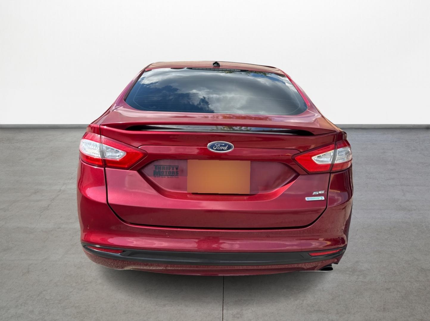 2013 Ford Fusion SE (3FA6P0HR6DR) with an 1.6L L4 DOHC 16V engine, located at 16710 Clay Rd., Houston, TX, 77084, (281) 859-7900, 29.834864, -95.656166 - Photo#5