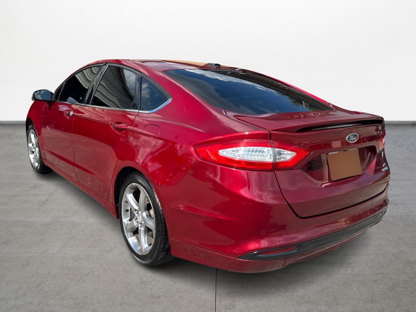 2013 Ford Fusion SE (3FA6P0HR6DR) with an 1.6L L4 DOHC 16V engine, located at 16710 Clay Rd., Houston, TX, 77084, (281) 859-7900, 29.834864, -95.656166 - Photo#6