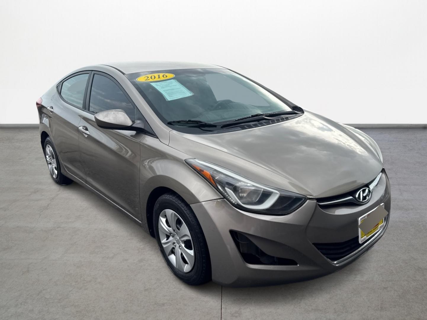 2016 Hyundai Elantra Limited (5NPDH4AE6GH) with an 1.8L L4 DOHC 16V engine, 6-Speed Automatic transmission, located at 16710 Clay Rd., Houston, TX, 77084, (281) 859-7900, 29.834864, -95.656166 - Photo#2