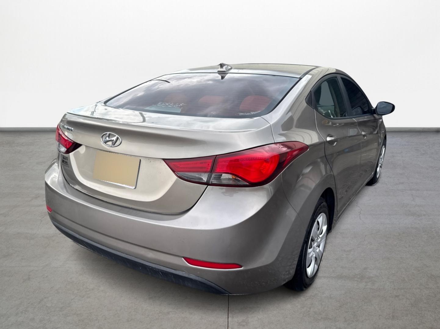 2016 Hyundai Elantra Limited (5NPDH4AE6GH) with an 1.8L L4 DOHC 16V engine, 6-Speed Automatic transmission, located at 16710 Clay Rd., Houston, TX, 77084, (281) 859-7900, 29.834864, -95.656166 - Photo#4