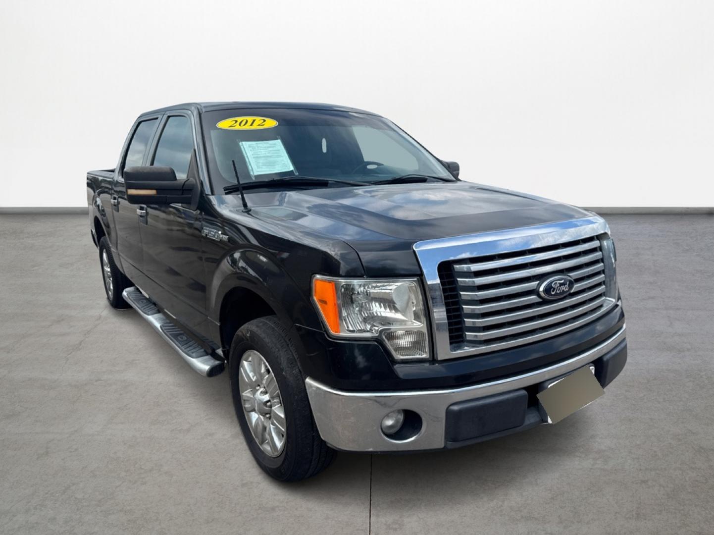 2012 Ford F-150 FX2 SuperCrew 5.5-ft. Bed 2WD (1FTFW1CF4CK) with an 5.0L V8 engine, 6-Speed Automatic transmission, located at 16710 Clay Rd., Houston, TX, 77084, (281) 859-7900, 29.834864, -95.656166 - Photo#2