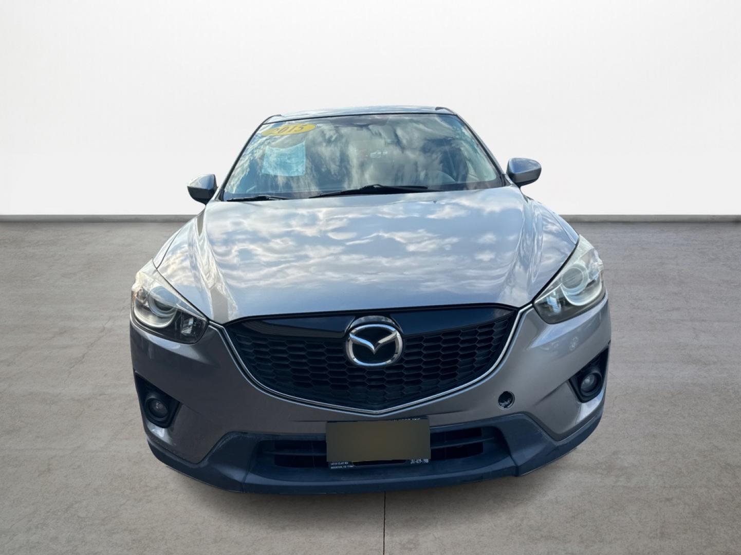 2015 Mazda CX-5 Touring (JM3KE2CY1F0) with an 2.5L L4 DOHC 16V engine, 6-Speed Automatic transmission, located at 16710 Clay Rd., Houston, TX, 77084, (281) 859-7900, 29.834864, -95.656166 - Photo#1