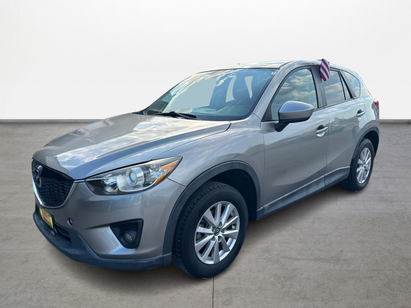 2015 Mazda CX-5 Touring (JM3KE2CY1F0) with an 2.5L L4 DOHC 16V engine, 6-Speed Automatic transmission, located at 16710 Clay Rd., Houston, TX, 77084, (281) 859-7900, 29.834864, -95.656166 - Photo#0