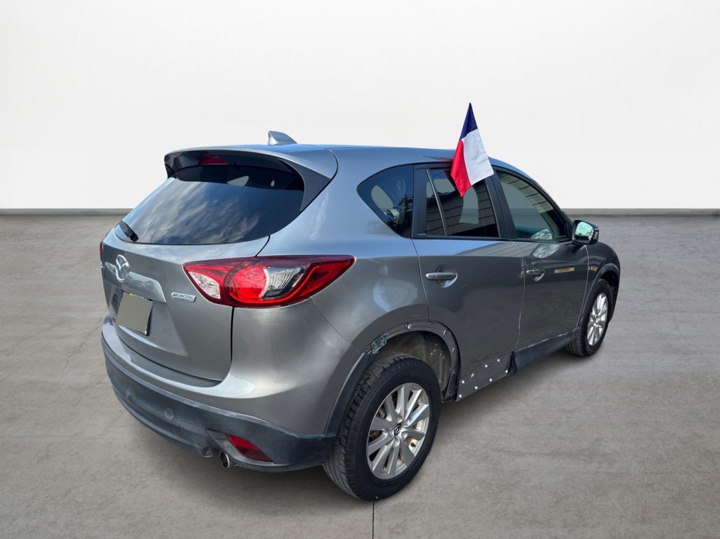 2015 Mazda CX-5 Touring (JM3KE2CY1F0) with an 2.5L L4 DOHC 16V engine, 6-Speed Automatic transmission, located at 16710 Clay Rd., Houston, TX, 77084, (281) 859-7900, 29.834864, -95.656166 - Photo#4