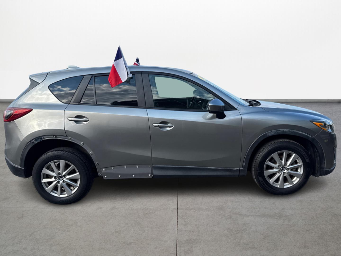 2015 Mazda CX-5 Touring (JM3KE2CY1F0) with an 2.5L L4 DOHC 16V engine, 6-Speed Automatic transmission, located at 16710 Clay Rd., Houston, TX, 77084, (281) 859-7900, 29.834864, -95.656166 - Photo#3