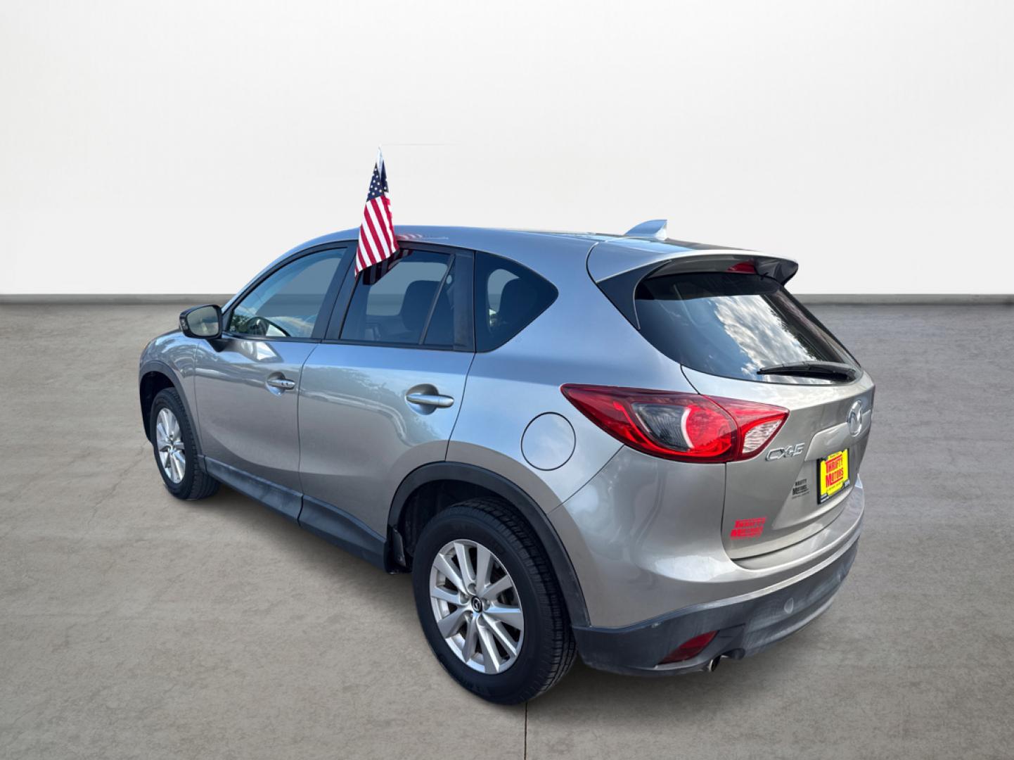 2015 Mazda CX-5 Touring (JM3KE2CY1F0) with an 2.5L L4 DOHC 16V engine, 6-Speed Automatic transmission, located at 16710 Clay Rd., Houston, TX, 77084, (281) 859-7900, 29.834864, -95.656166 - Photo#6