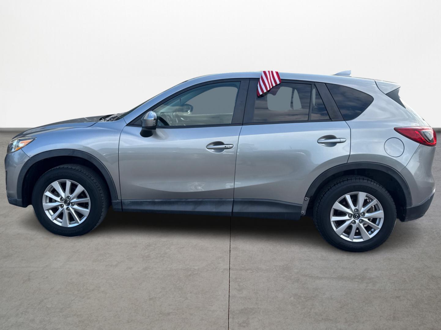 2015 Mazda CX-5 Touring (JM3KE2CY1F0) with an 2.5L L4 DOHC 16V engine, 6-Speed Automatic transmission, located at 16710 Clay Rd., Houston, TX, 77084, (281) 859-7900, 29.834864, -95.656166 - Photo#7