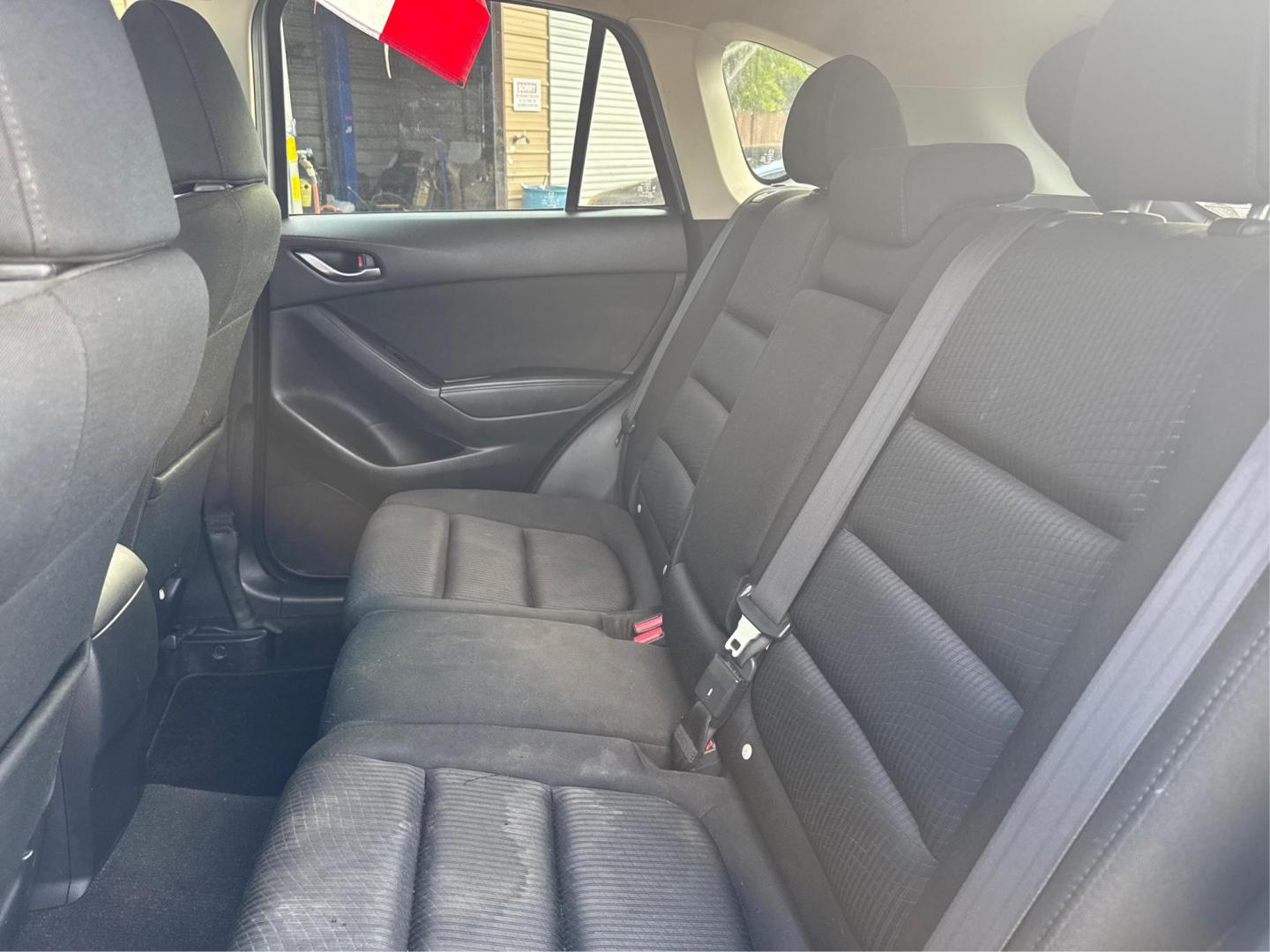 2015 Mazda CX-5 Touring (JM3KE2CY1F0) with an 2.5L L4 DOHC 16V engine, 6-Speed Automatic transmission, located at 16710 Clay Rd., Houston, TX, 77084, (281) 859-7900, 29.834864, -95.656166 - Photo#10