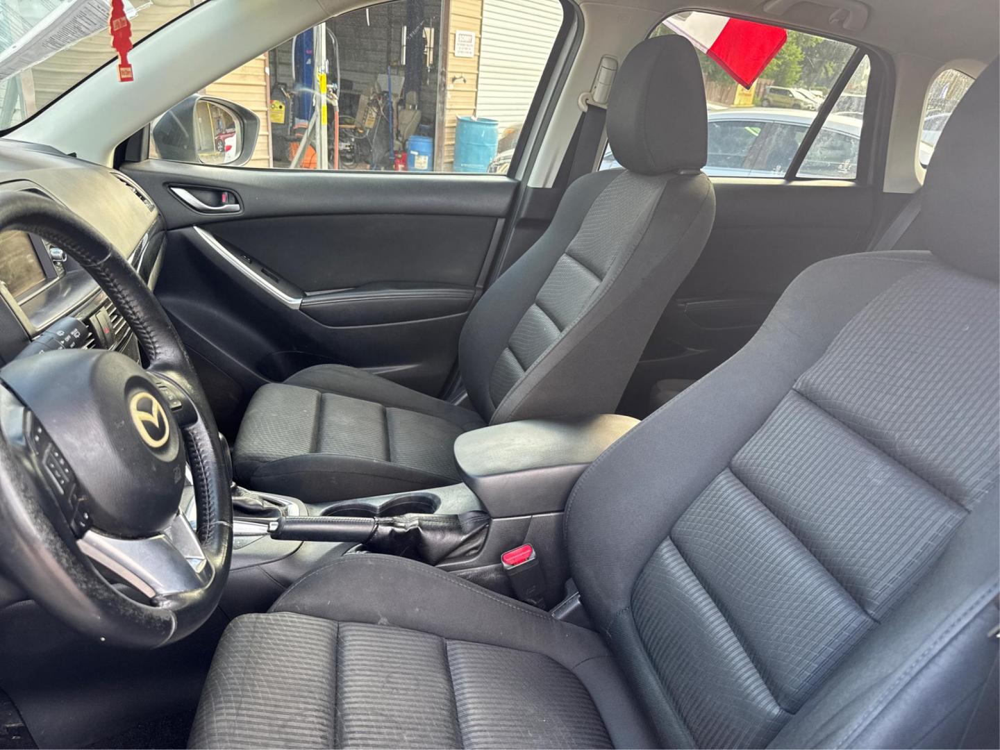2015 Mazda CX-5 Touring (JM3KE2CY1F0) with an 2.5L L4 DOHC 16V engine, 6-Speed Automatic transmission, located at 16710 Clay Rd., Houston, TX, 77084, (281) 859-7900, 29.834864, -95.656166 - Photo#8