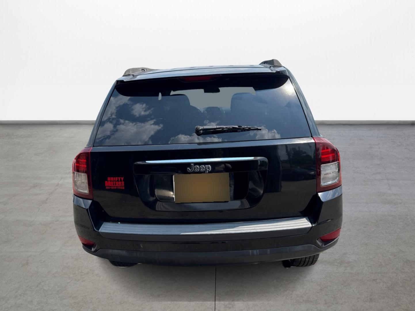 2014 Jeep Compass Sport FWD (1C4NJCBA6ED) with an 2.0L L4 DOHC 16V engine, located at 16710 Clay Rd., Houston, TX, 77084, (281) 859-7900, 29.834864, -95.656166 - Photo#5