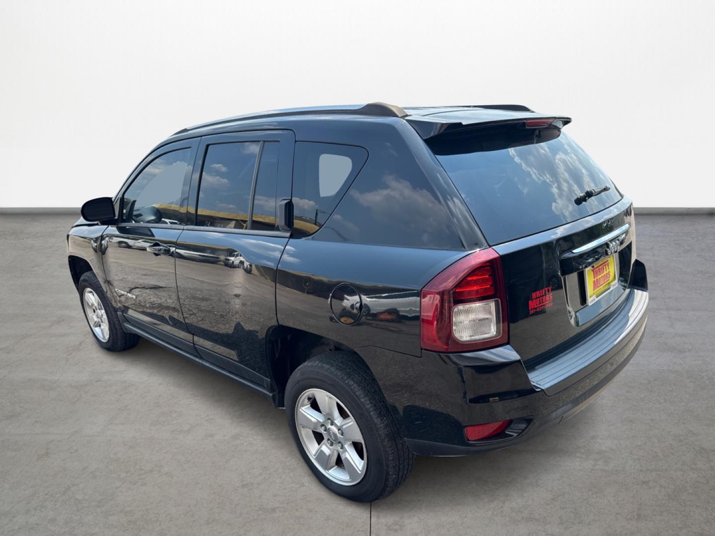 2014 Jeep Compass Sport FWD (1C4NJCBA6ED) with an 2.0L L4 DOHC 16V engine, located at 16710 Clay Rd., Houston, TX, 77084, (281) 859-7900, 29.834864, -95.656166 - Photo#6