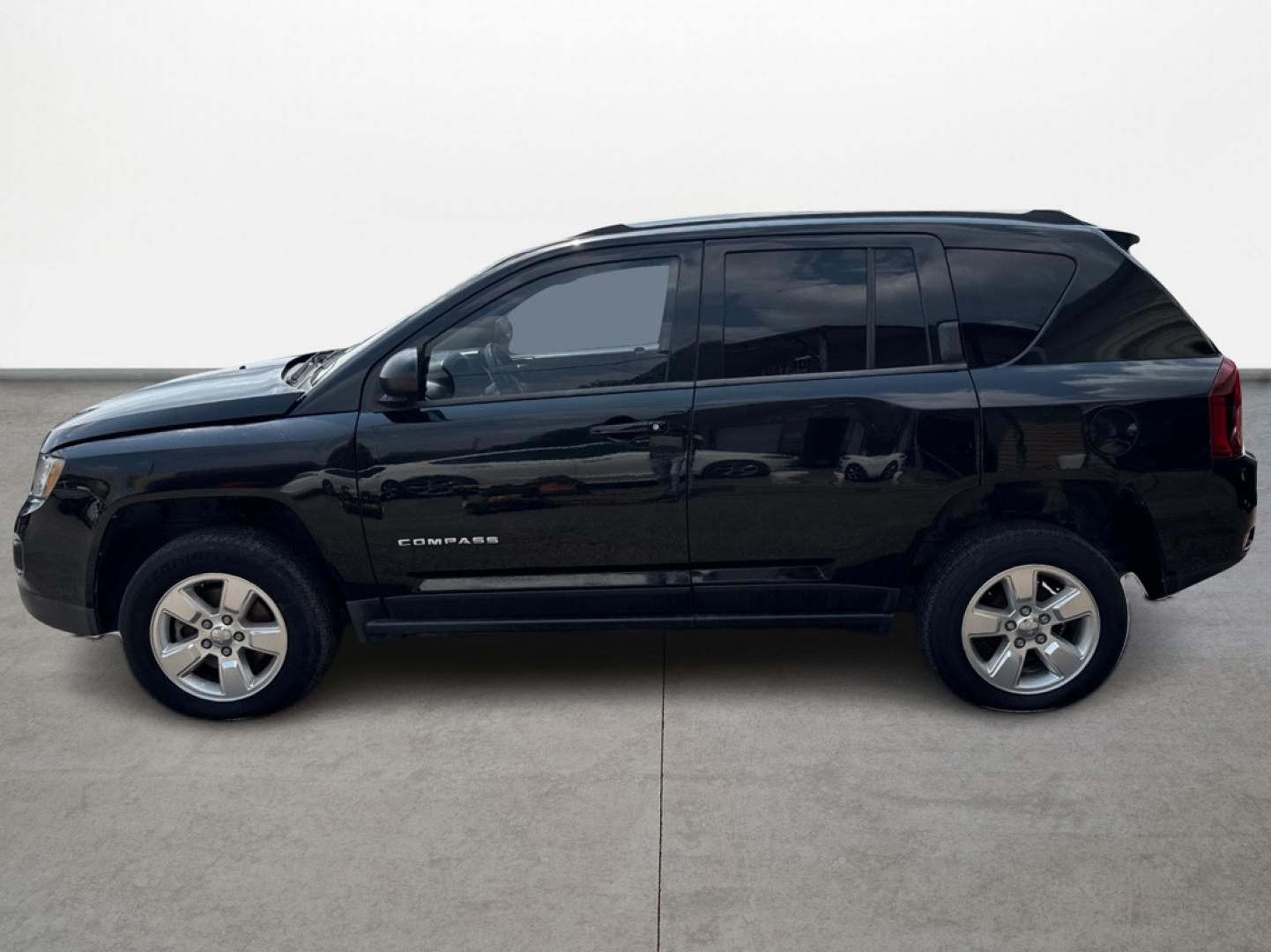 2014 Jeep Compass Sport FWD (1C4NJCBA6ED) with an 2.0L L4 DOHC 16V engine, located at 16710 Clay Rd., Houston, TX, 77084, (281) 859-7900, 29.834864, -95.656166 - Photo#7