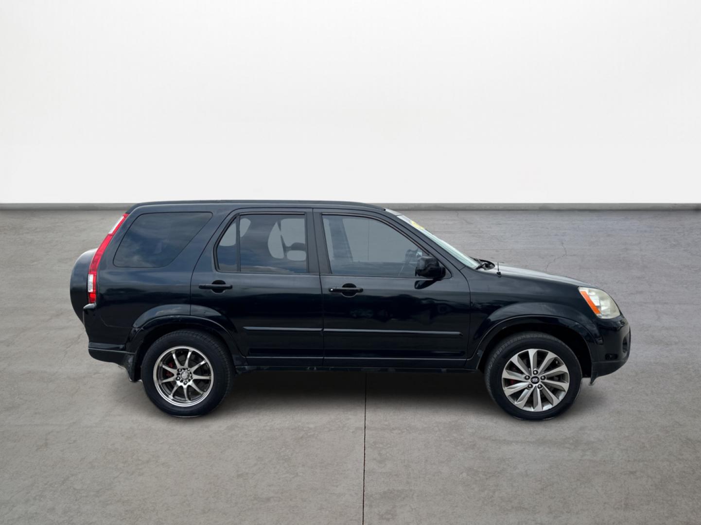 2006 Honda CR-V SE 4WD AT (JHLRD78906C) with an 2.4L L4 DOHC 16V engine, 5-Speed Automatic Overdrive transmission, located at 16710 Clay Rd., Houston, TX, 77084, (281) 859-7900, 29.834864, -95.656166 - Photo#3