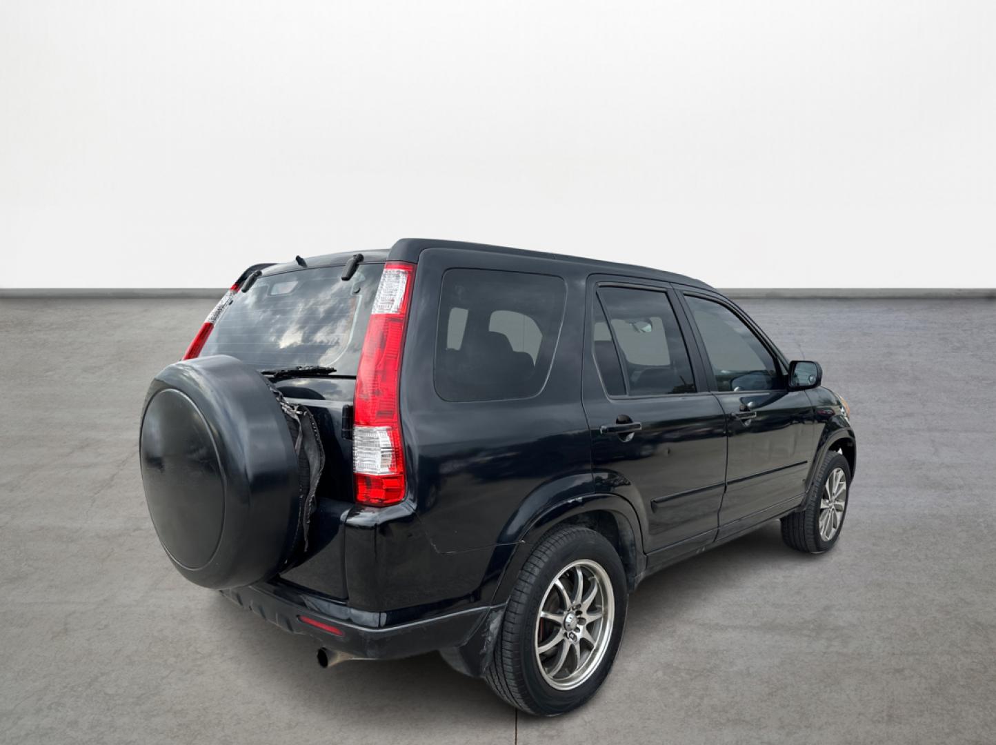 2006 Honda CR-V SE 4WD AT (JHLRD78906C) with an 2.4L L4 DOHC 16V engine, 5-Speed Automatic Overdrive transmission, located at 16710 Clay Rd., Houston, TX, 77084, (281) 859-7900, 29.834864, -95.656166 - Photo#4