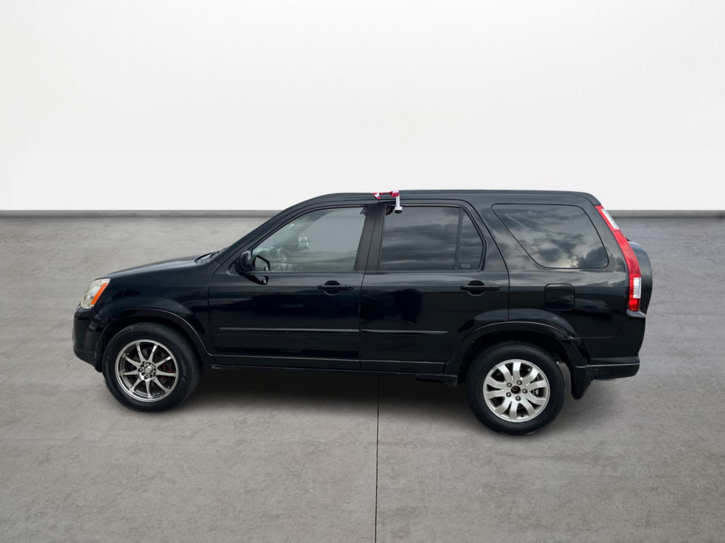 2006 Honda CR-V SE 4WD AT (JHLRD78906C) with an 2.4L L4 DOHC 16V engine, 5-Speed Automatic Overdrive transmission, located at 16710 Clay Rd., Houston, TX, 77084, (281) 859-7900, 29.834864, -95.656166 - Photo#7