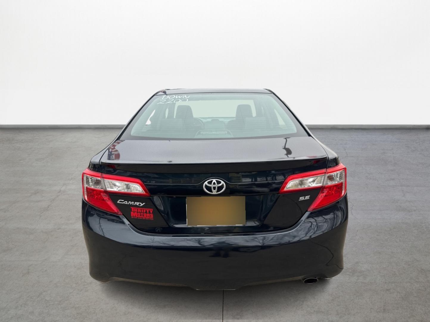2014 Toyota Camry SE (4T1BF1FKXEU) with an 2.5L L4 DOHC 16V engine, 6-Speed Automatic transmission, located at 16710 Clay Rd., Houston, TX, 77084, (281) 859-7900, 29.834864, -95.656166 - Photo#1