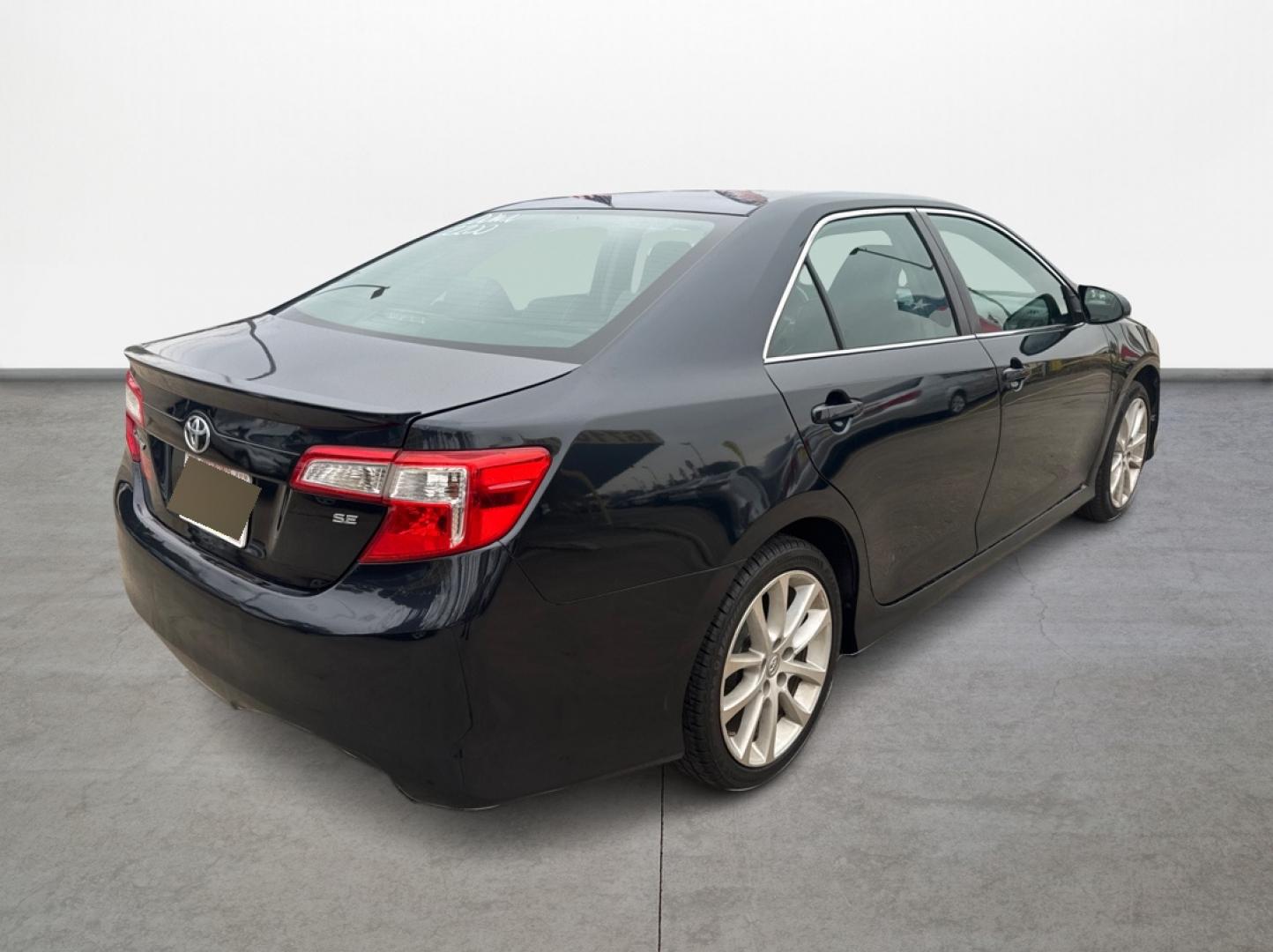 2014 Toyota Camry SE (4T1BF1FKXEU) with an 2.5L L4 DOHC 16V engine, 6-Speed Automatic transmission, located at 16710 Clay Rd., Houston, TX, 77084, (281) 859-7900, 29.834864, -95.656166 - Photo#0