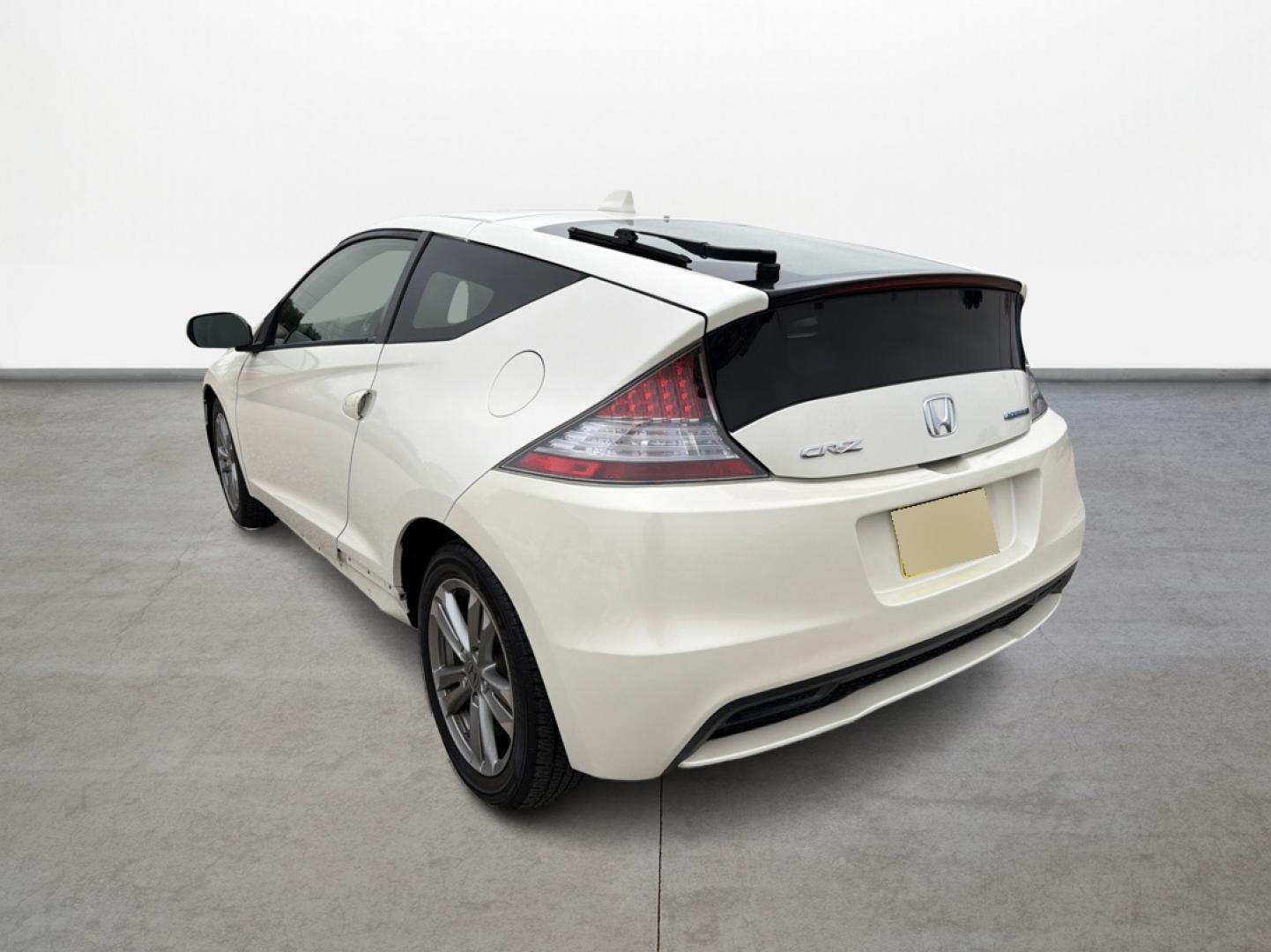 2013 Honda CR-Z EX CVT (JHMZF1D61DS) with an 1.5L L4 SOHC 16V HYBRID engine, Continuously Variable Transmission transmission, located at 16710 Clay Rd., Houston, TX, 77084, (281) 859-7900, 29.834864, -95.656166 - Photo#2