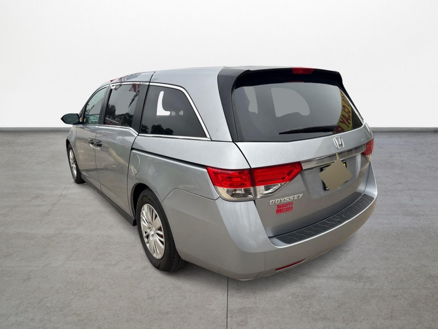 2016 Honda Odyssey LX (5FNRL5H26GB) with an 3.5L V6 SOHC 24V engine, 6A transmission, located at 16710 Clay Rd., Houston, TX, 77084, (281) 859-7900, 29.834864, -95.656166 - Photo#2