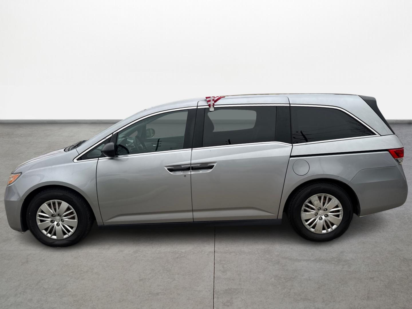 2016 Honda Odyssey LX (5FNRL5H26GB) with an 3.5L V6 SOHC 24V engine, 6A transmission, located at 16710 Clay Rd., Houston, TX, 77084, (281) 859-7900, 29.834864, -95.656166 - Photo#3