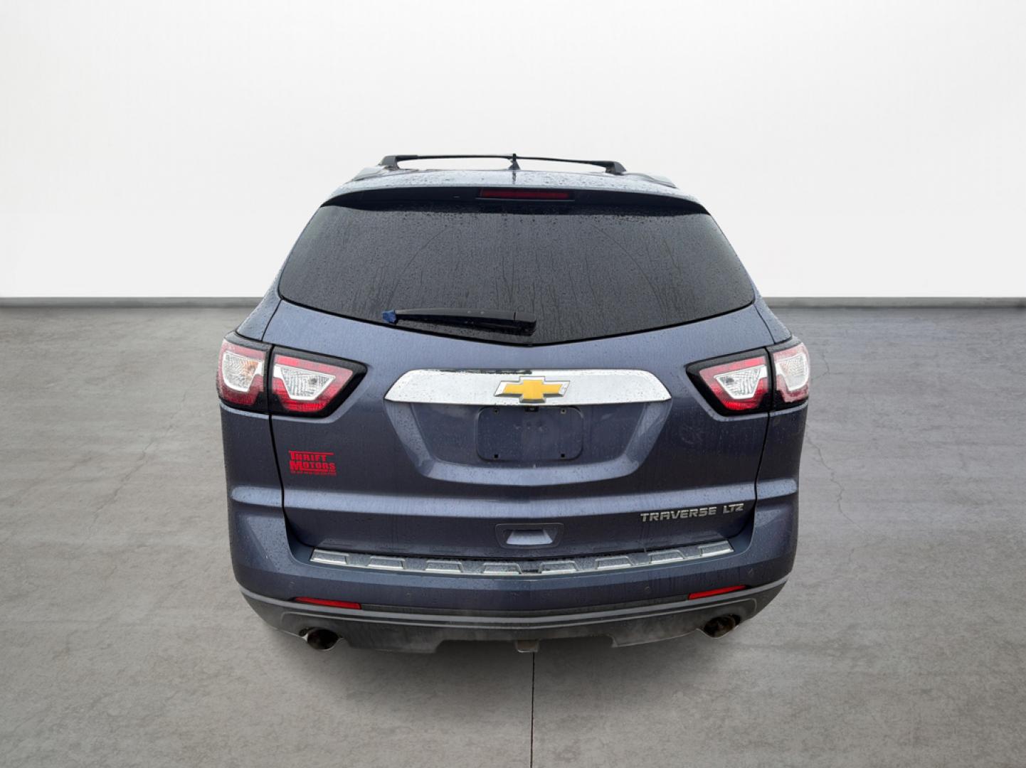 2014 Chevrolet Traverse LTZ FWD (1GNKRJKD0EJ) with an 3.6L V6 DOHC 24V engine, 6-Speed Automatic transmission, located at 16710 Clay Rd., Houston, TX, 77084, (281) 859-7900, 29.834864, -95.656166 - Photo#5