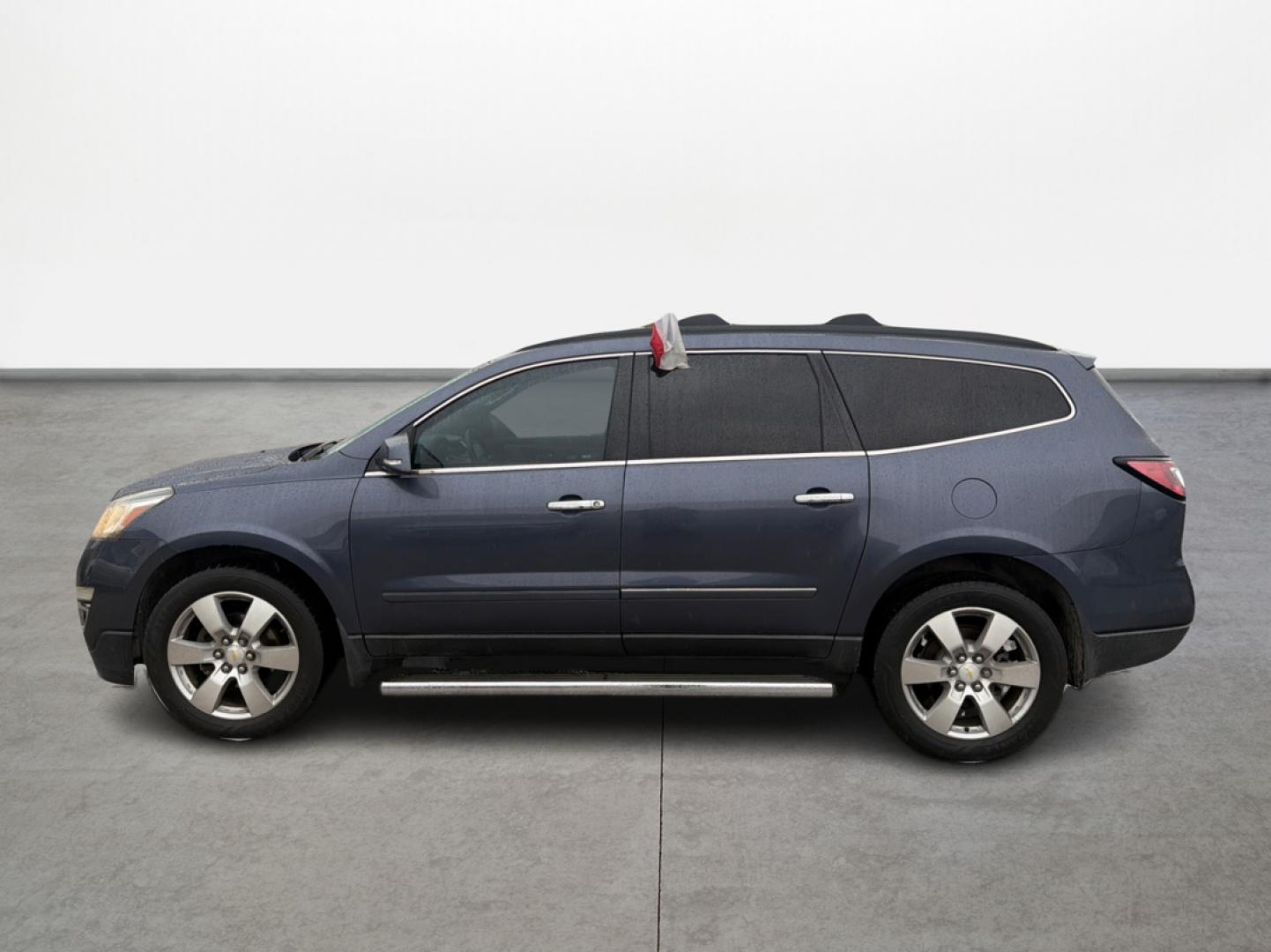 2014 Chevrolet Traverse LTZ FWD (1GNKRJKD0EJ) with an 3.6L V6 DOHC 24V engine, 6-Speed Automatic transmission, located at 16710 Clay Rd., Houston, TX, 77084, (281) 859-7900, 29.834864, -95.656166 - Photo#7