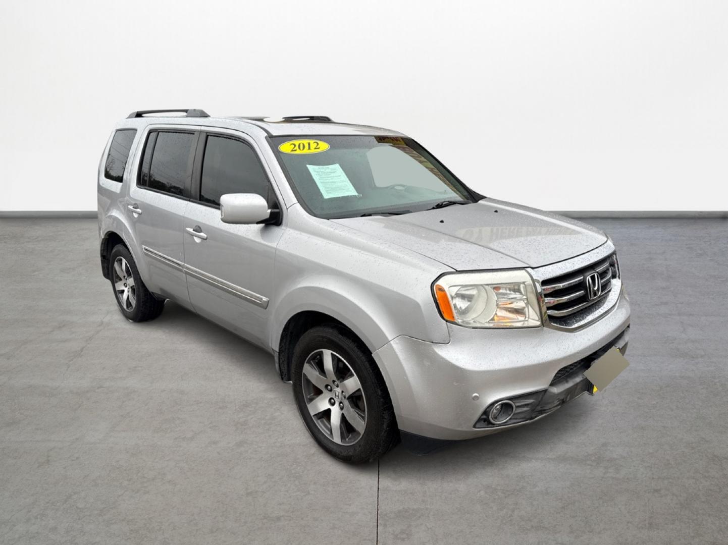 2012 Honda Pilot Touring 2WD 5-Spd AT with DVD (5FNYF3H90CB) with an 3.5L V6 SOHC 24V engine, 5-Speed Automatic transmission, located at 16710 Clay Rd., Houston, TX, 77084, (281) 859-7900, 29.834864, -95.656166 - Photo#2