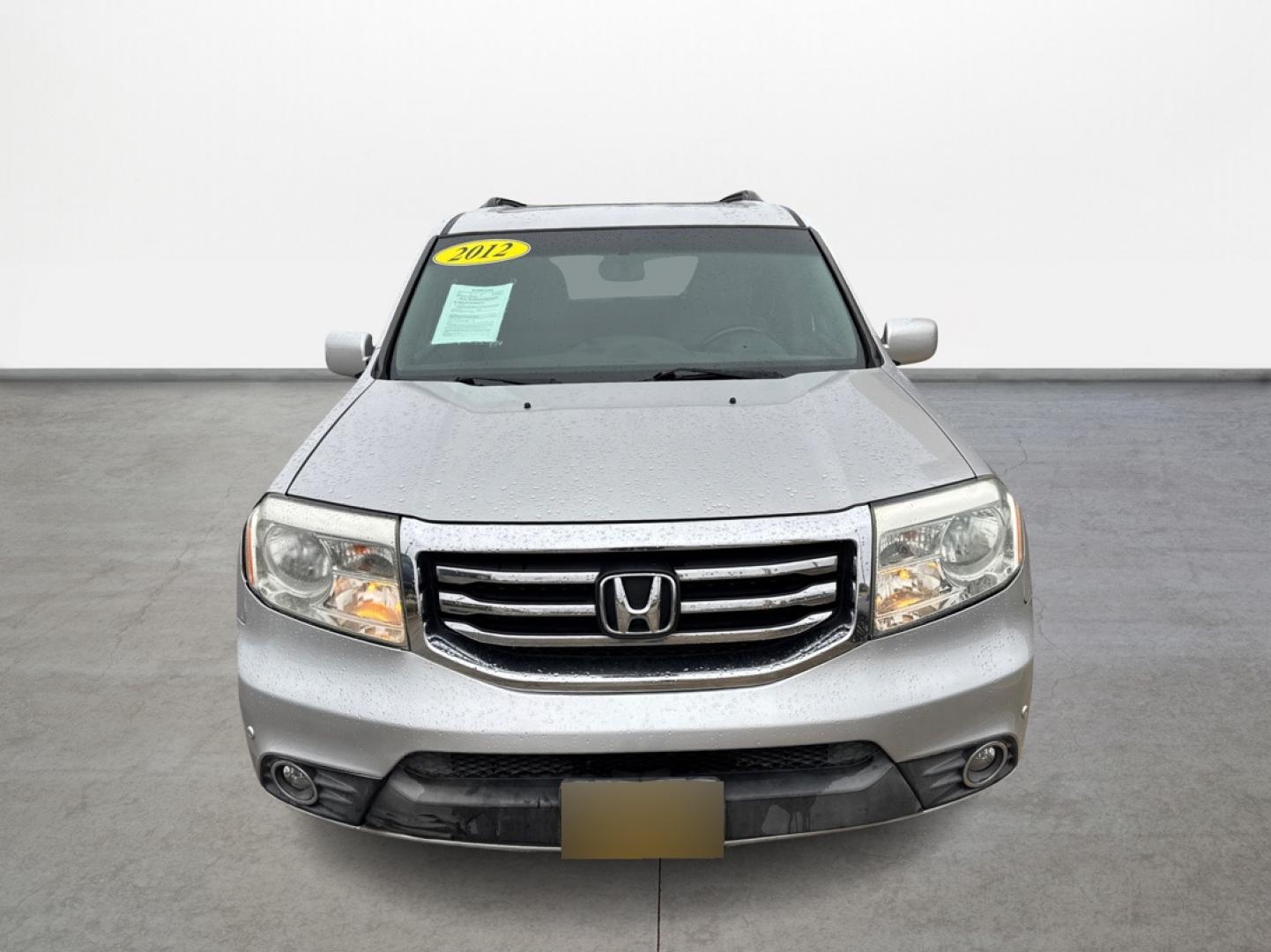 2012 Honda Pilot Touring 2WD 5-Spd AT with DVD (5FNYF3H90CB) with an 3.5L V6 SOHC 24V engine, 5-Speed Automatic transmission, located at 16710 Clay Rd., Houston, TX, 77084, (281) 859-7900, 29.834864, -95.656166 - Photo#1
