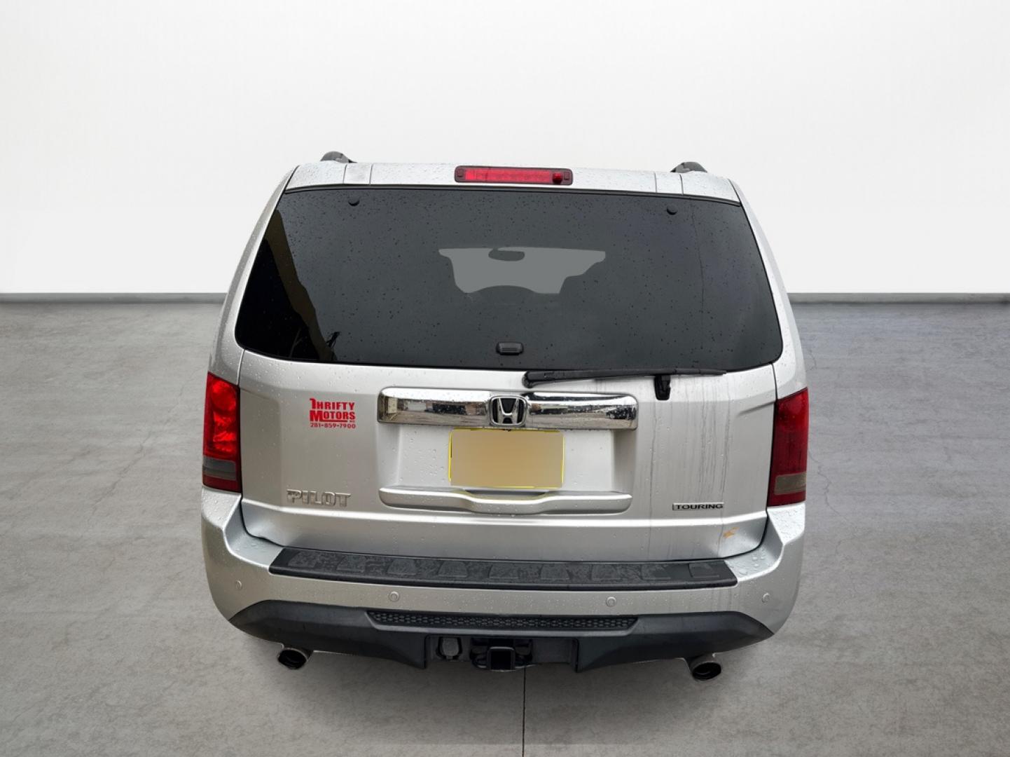 2012 Honda Pilot Touring 2WD 5-Spd AT with DVD (5FNYF3H90CB) with an 3.5L V6 SOHC 24V engine, 5-Speed Automatic transmission, located at 16710 Clay Rd., Houston, TX, 77084, (281) 859-7900, 29.834864, -95.656166 - Photo#5