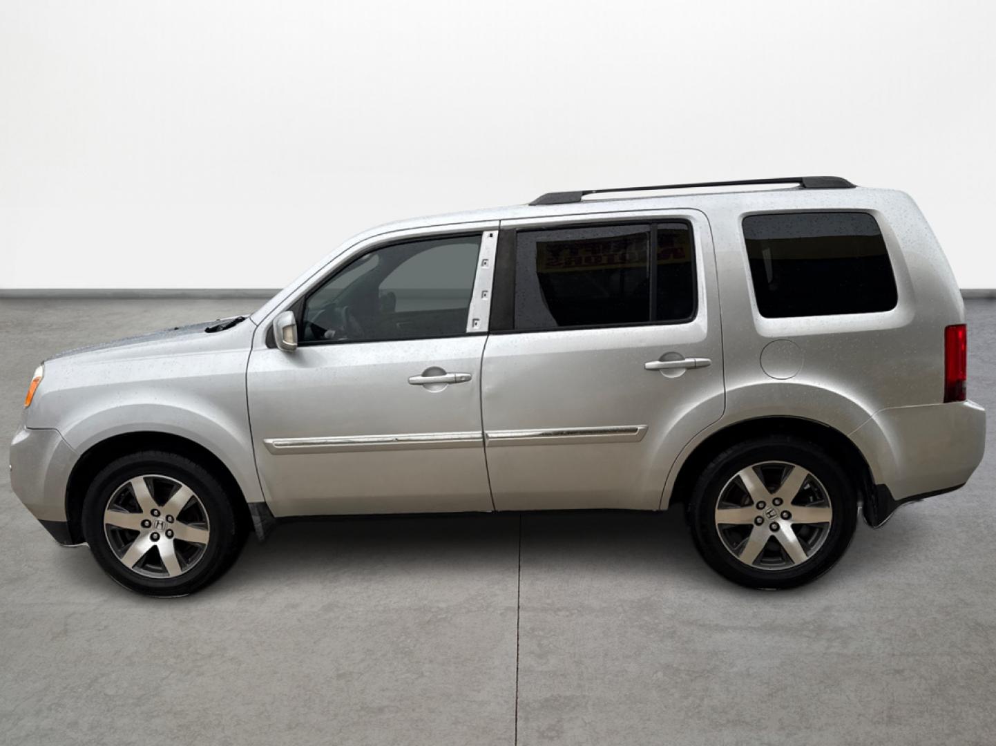 2012 Honda Pilot Touring 2WD 5-Spd AT with DVD (5FNYF3H90CB) with an 3.5L V6 SOHC 24V engine, 5-Speed Automatic transmission, located at 16710 Clay Rd., Houston, TX, 77084, (281) 859-7900, 29.834864, -95.656166 - Photo#7