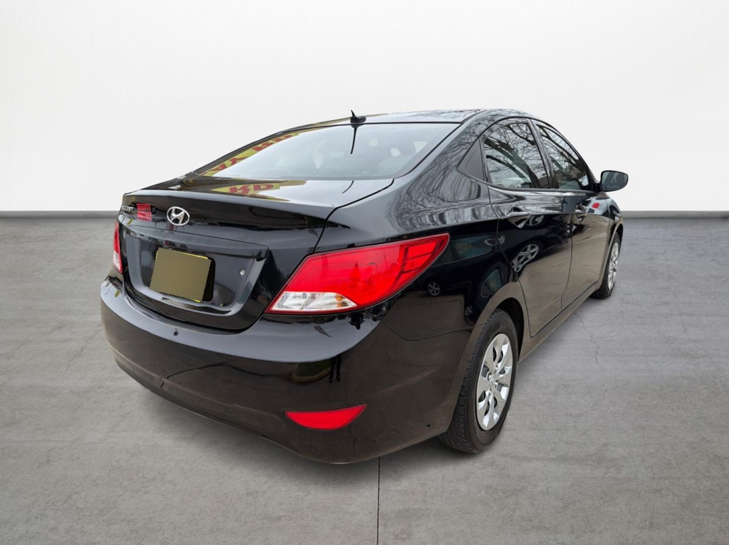 2017 Hyundai Accent SE 4-Door 6M (KMHCT4AE7HU) with an 1.6L L4 DOHC 16V engine, 6M transmission, located at 16710 Clay Rd., Houston, TX, 77084, (281) 859-7900, 29.834864, -95.656166 - Photo#4