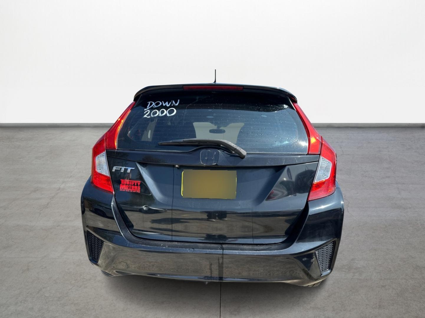 2015 Honda Fit LX CVT (3HGGK5H58FM) with an 1.5L L4 SOHC 16V engine, Continuously Variable Transmission transmission, located at 16710 Clay Rd., Houston, TX, 77084, (281) 859-7900, 29.834864, -95.656166 - Photo#5