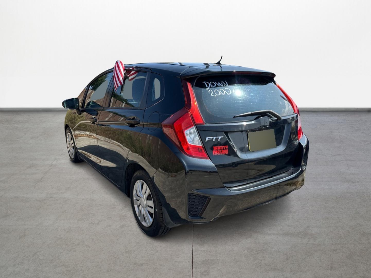 2015 Honda Fit LX CVT (3HGGK5H58FM) with an 1.5L L4 SOHC 16V engine, Continuously Variable Transmission transmission, located at 16710 Clay Rd., Houston, TX, 77084, (281) 859-7900, 29.834864, -95.656166 - Photo#6