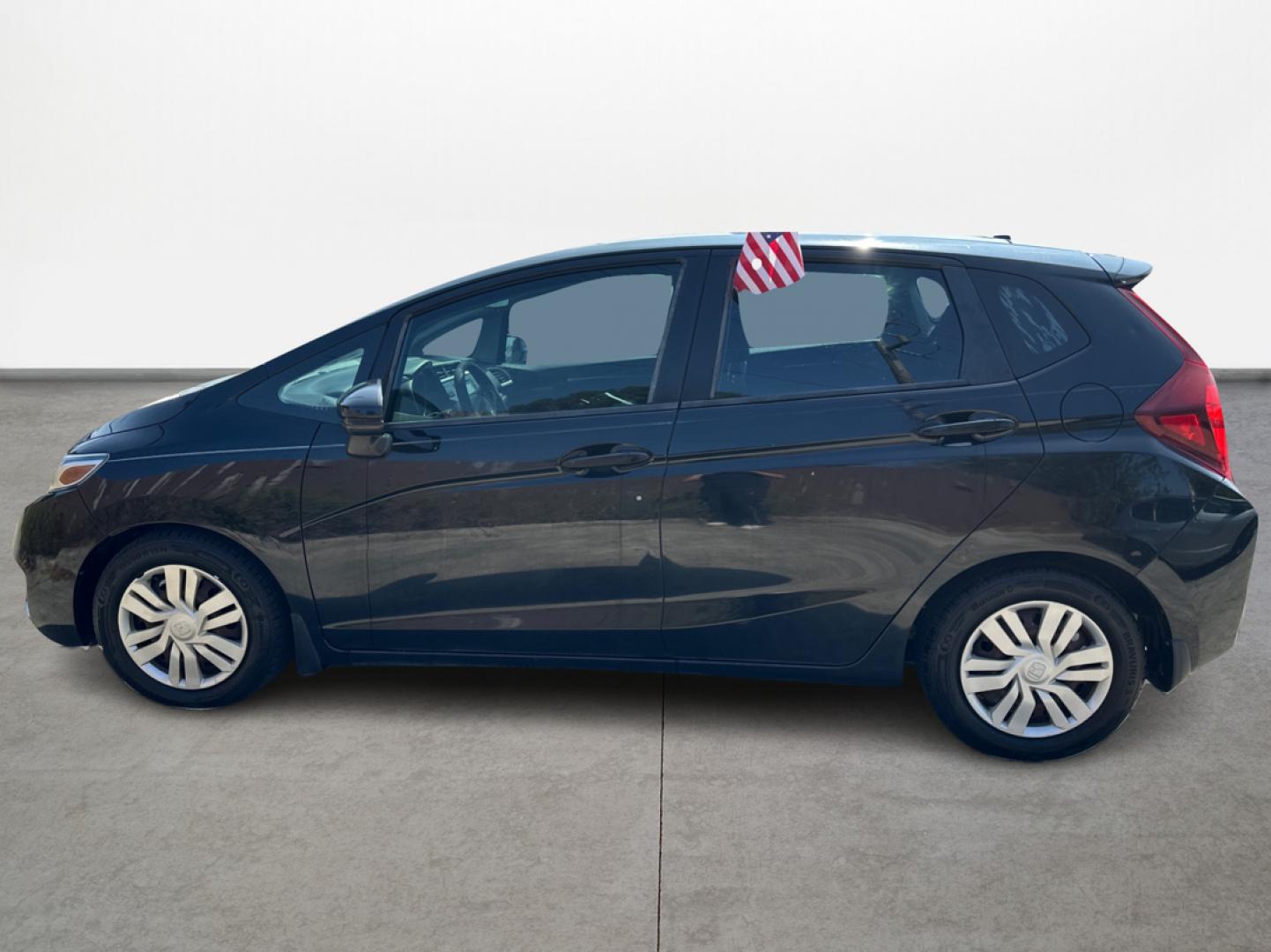 2015 Honda Fit LX CVT (3HGGK5H58FM) with an 1.5L L4 SOHC 16V engine, Continuously Variable Transmission transmission, located at 16710 Clay Rd., Houston, TX, 77084, (281) 859-7900, 29.834864, -95.656166 - Photo#7